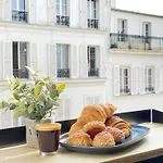 Elegant Montmartre Apartment Overlooking Paris Rooftops